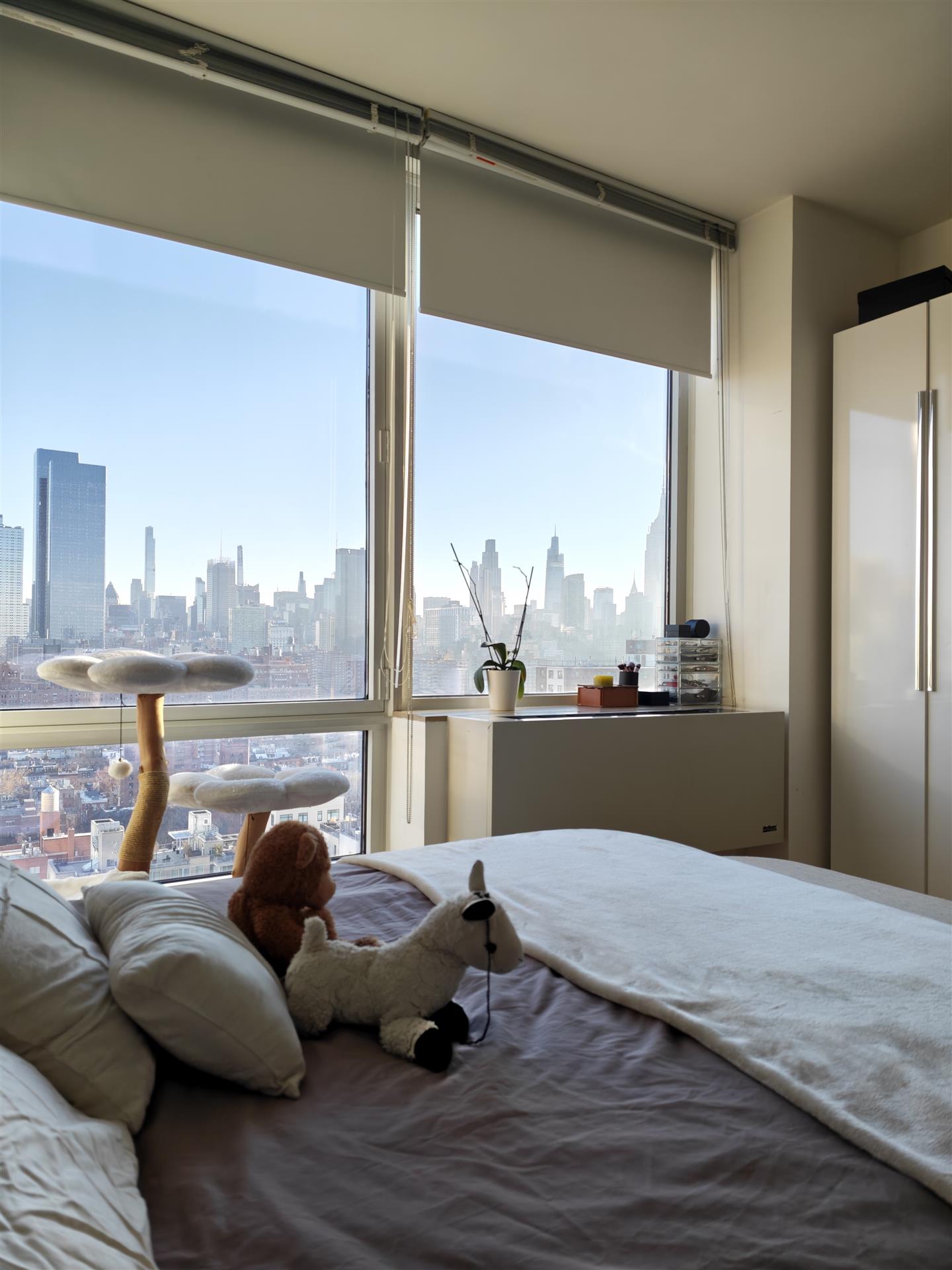 A bedroom overlooking New York at Sky25 Chelsea