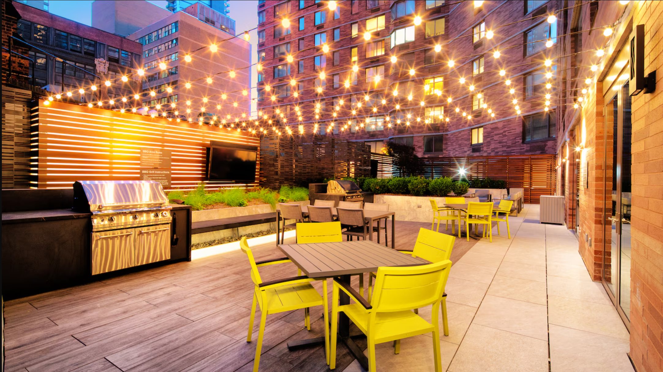 Casaé Avalon shared terrace illuminated in the evening